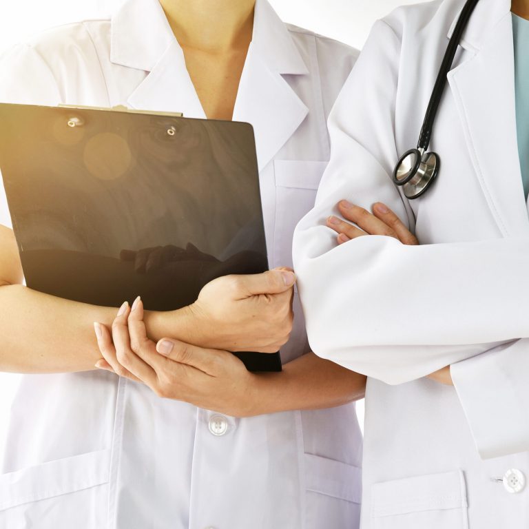 Doctor and nurse in uniform, Hospital and Healthcare staff, Professional medical care provider.